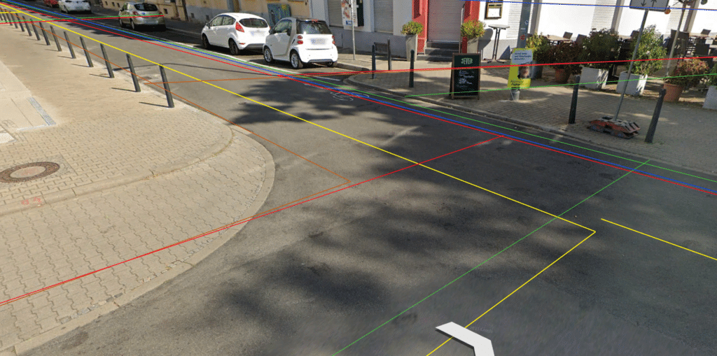 Eine Straßenecke mit eingezeichneten Leitungsplänen